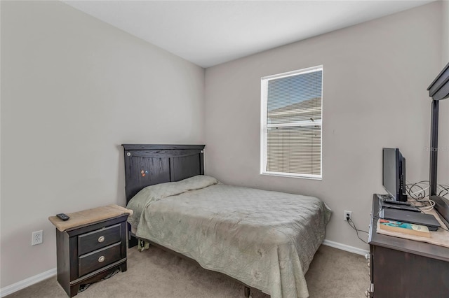 209 Grouper Ct, Poinciana, FL 34759 - bedroom with light colored carpet and baseboards