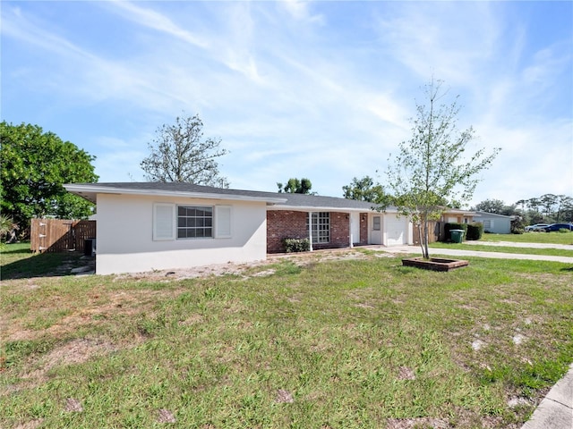 1432 Findlay St, Deltona, FL 32725 - ranch-style home featuring driveway and stucco siding