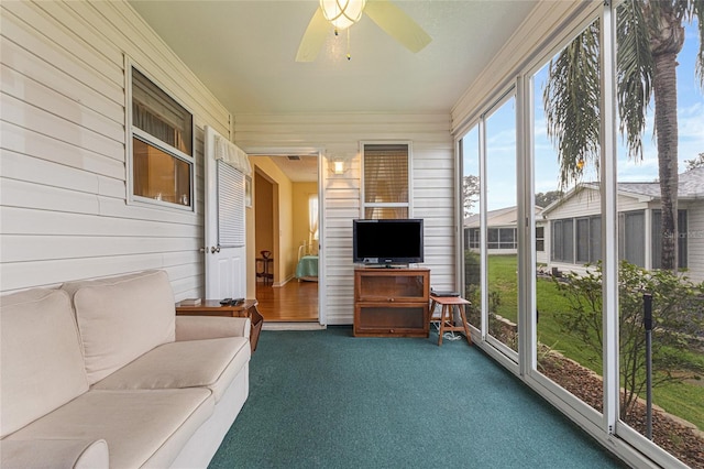 8076 SE 174th Belhaven Loop, The Villages, FL 32162 - unfurnished sunroom featuring ceiling fan
