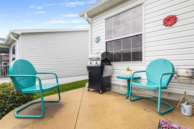 8076 SE 174th Belhaven Loop, The Villages, FL 32162 - view of patio / terrace featuring grilling area