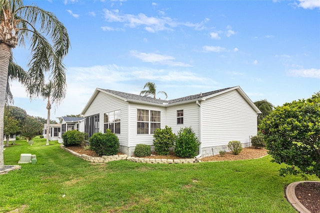 8076 SE 174th Belhaven Loop, The Villages, FL 32162 - view of side of home featuring a yard