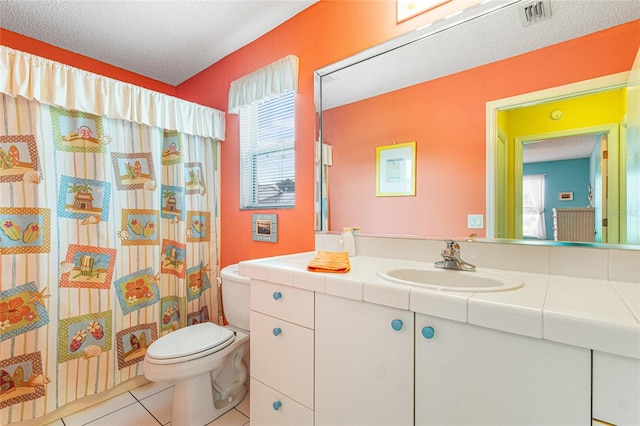 8076 SE 174th Belhaven Loop, The Villages, FL 32162 - full bathroom with vanity, tile patterned floors, and a textured ceiling