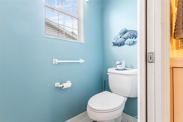 8076 SE 174th Belhaven Loop, The Villages, FL 32162 - bathroom featuring toilet and baseboards