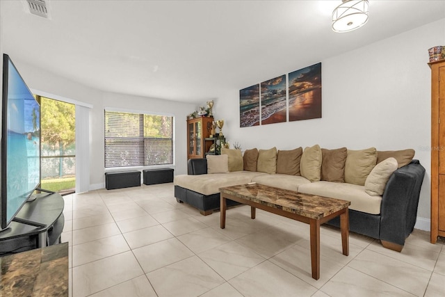 7421 Sugar Bend Dr Unit 7421, Orlando, FL 32819 - living room with light tile patterned floors
