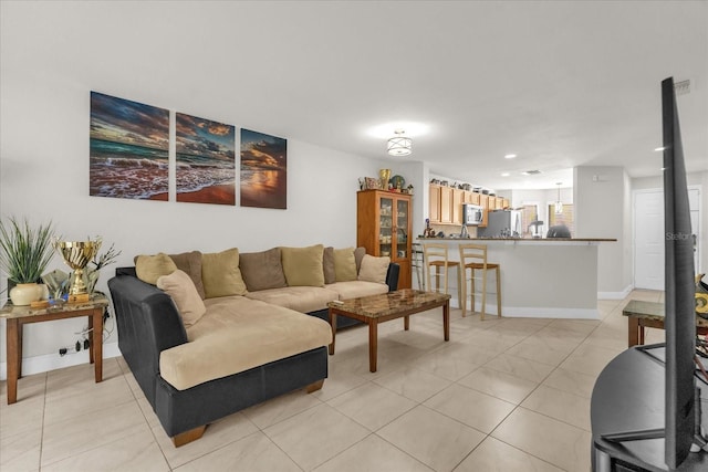 7421 Sugar Bend Dr Unit 7421, Orlando, FL 32819 - living area featuring light tile patterned floors and recessed lighting