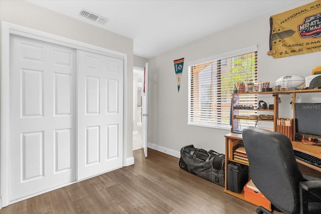 7421 Sugar Bend Dr Unit 7421, Orlando, FL 32819 - office space featuring wood finished floors and baseboards
