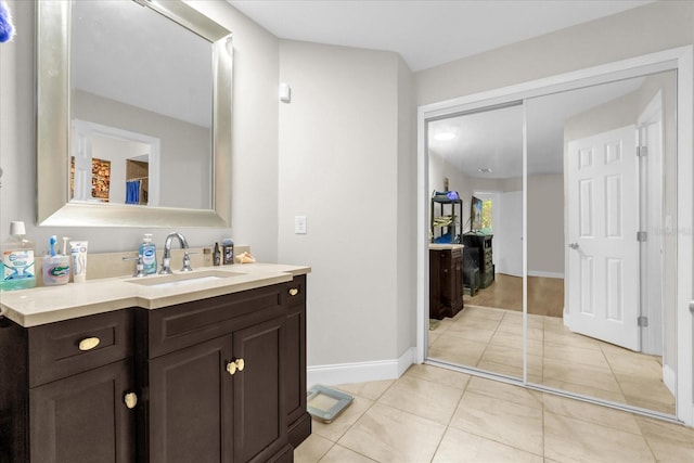7421 Sugar Bend Dr Unit 7421, Orlando, FL 32819 - bathroom with vanity and tile patterned flooring