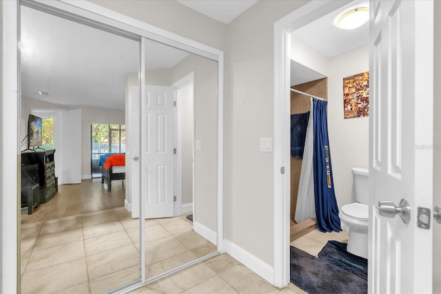 7421 Sugar Bend Dr Unit 7421, Orlando, FL 32819 - corridor with tile patterned floors