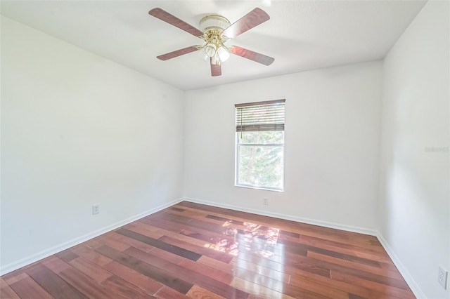 7716 Nottinghill Sky Dr, Apollo Beach, FL 33572 - empty room with wood finished floors and a ceiling fan