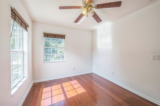 7716 Nottinghill Sky Dr, Apollo Beach, FL 33572 - spare room with wood finished floors and a ceiling fan