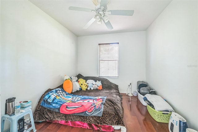 7716 Nottinghill Sky Dr, Apollo Beach, FL 33572 - bedroom with wood finished floors and a ceiling fan