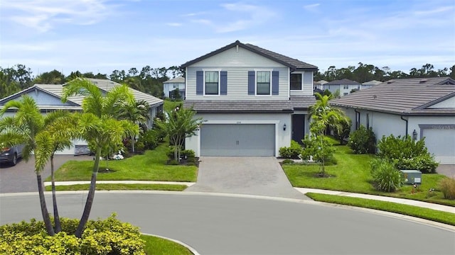 6256 Baywood Ct, Bradenton, FL 34211 - view of front of property featuring a garage, concrete driveway, and a front yard