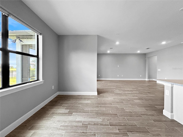 6256 Baywood Ct, Bradenton, FL 34211 - unfurnished room featuring wood finished floors and recessed lighting