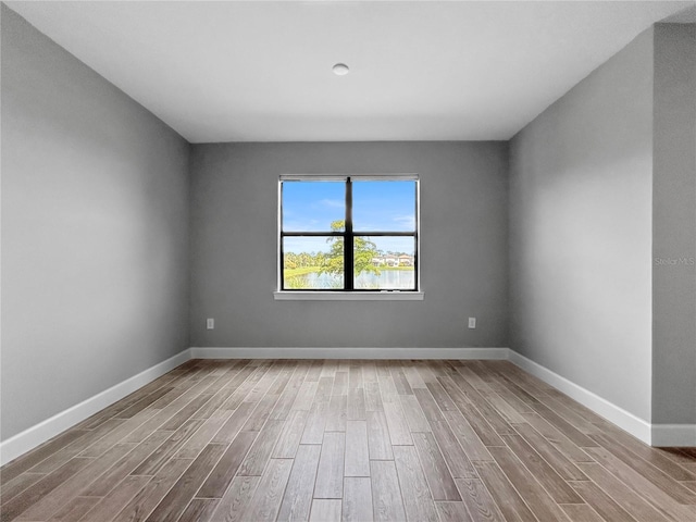 6256 Baywood Ct, Bradenton, FL 34211 - empty room with wood finished floors