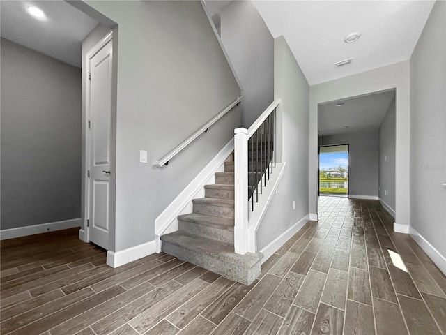6256 Baywood Ct, Bradenton, FL 34211 - staircase with wood finished floors and baseboards