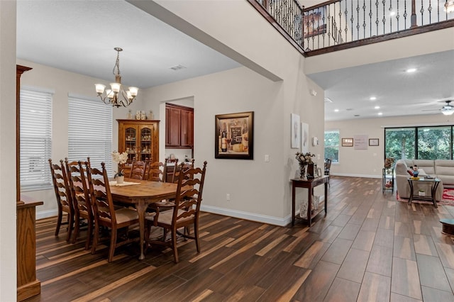 13525 Gorgona Isle Dr, Windermere, FL 34786 - dining room featuring dark wood-style flooring, a chandelier, and ceiling fan