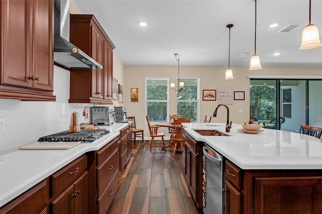 13525 Gorgona Isle Dr, Windermere, FL 34786 - kitchen with wall chimney range hood, stainless steel appliances, healthy amount of natural light, light countertops, and recessed lighting