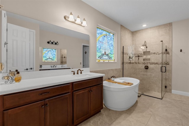 13525 Gorgona Isle Dr, Windermere, FL 34786 - bathroom featuring a freestanding tub, a shower stall, and vanity