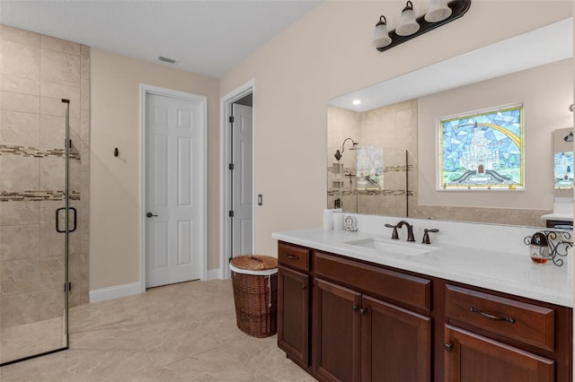 13525 Gorgona Isle Dr, Windermere, FL 34786 - bathroom featuring a shower stall, vanity, and tile patterned floors
