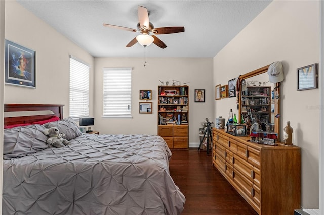 13525 Gorgona Isle Dr, Windermere, FL 34786 - bedroom featuring dark wood finished floors and ceiling fan
