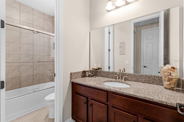 13525 Gorgona Isle Dr, Windermere, FL 34786 - bathroom with vanity, combined bath / shower with glass door, and tile patterned floors
