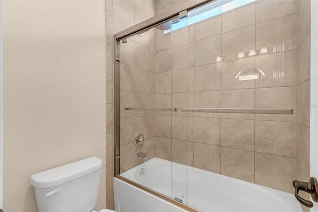 13525 Gorgona Isle Dr, Windermere, FL 34786 - full bathroom featuring toilet and shower / bath combination with glass door
