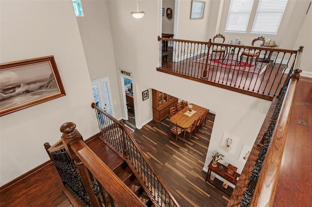 13525 Gorgona Isle Dr, Windermere, FL 34786 - stairs featuring wood finished floors and a towering ceiling