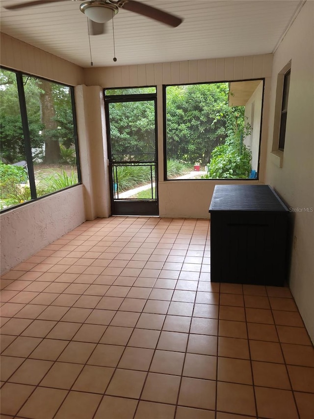 2320 NE 43rd St, Ocala, FL 34479 - unfurnished sunroom featuring plenty of natural light and tile patterned floors
