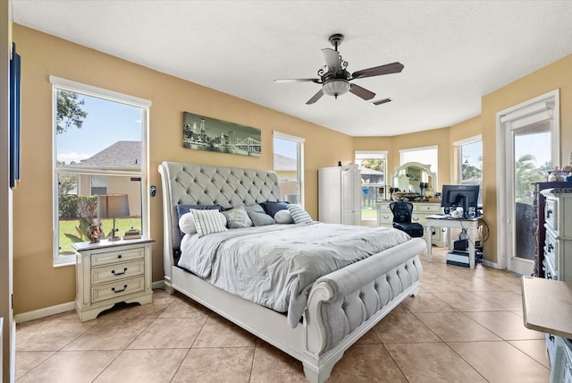 13147 Meergate Cir, Orlando, FL 32837 - bedroom featuring light tile patterned floors and ceiling fan