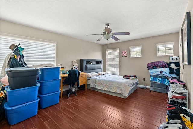 13147 Meergate Cir, Orlando, FL 32837 - bedroom featuring dark wood finished floors and ceiling fan