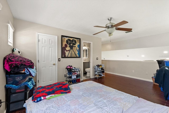 13147 Meergate Cir, Orlando, FL 32837 - bedroom with wood finished floors, ensuite bathroom, and ceiling fan