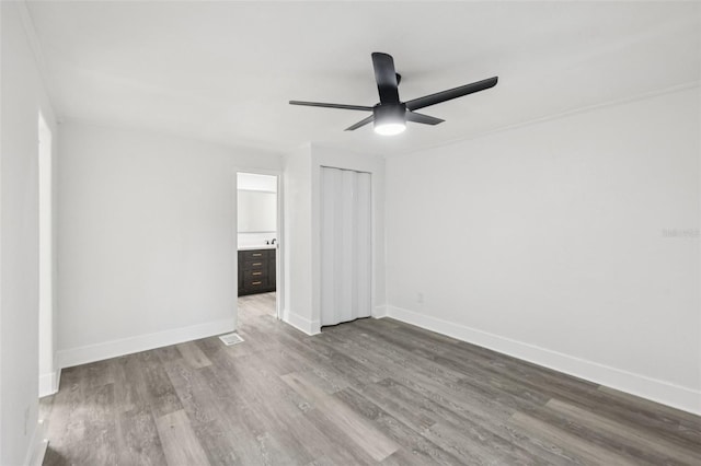 18015 Beach St, Umatilla, FL 32784 - unfurnished room with a ceiling fan and wood finished floors