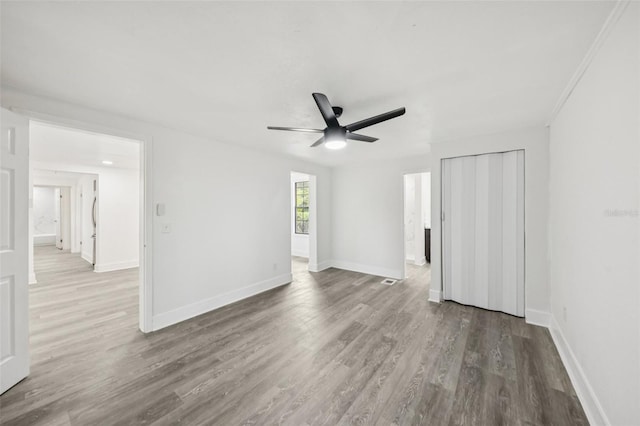 18015 Beach St, Umatilla, FL 32784 - unfurnished room with a ceiling fan and wood finished floors