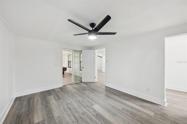 18015 Beach St, Umatilla, FL 32784 - unfurnished room featuring wood finished floors and a ceiling fan
