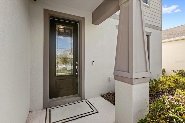 5065 Sparkling Water Way, Kissimmee, FL 34746 - view of exterior entry with stucco siding