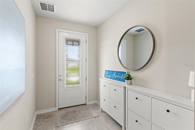 5065 Sparkling Water Way, Kissimmee, FL 34746 - doorway to outside featuring baseboards