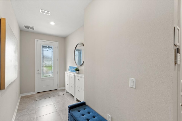 5065 Sparkling Water Way, Kissimmee, FL 34746 - foyer featuring baseboards and light tile patterned flooring