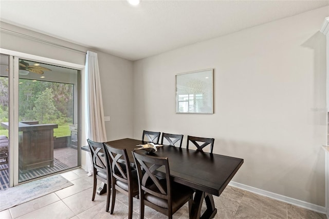 5065 Sparkling Water Way, Kissimmee, FL 34746 - dining area with baseboards