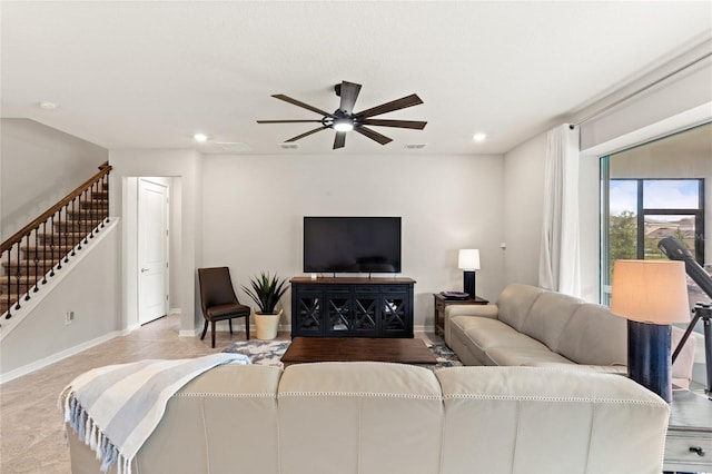 5065 Sparkling Water Way, Kissimmee, FL 34746 - living area with stairs, a ceiling fan, and recessed lighting