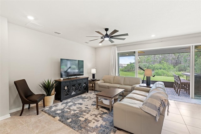 5065 Sparkling Water Way, Kissimmee, FL 34746 - living area featuring a ceiling fan, light tile patterned floors, and recessed lighting