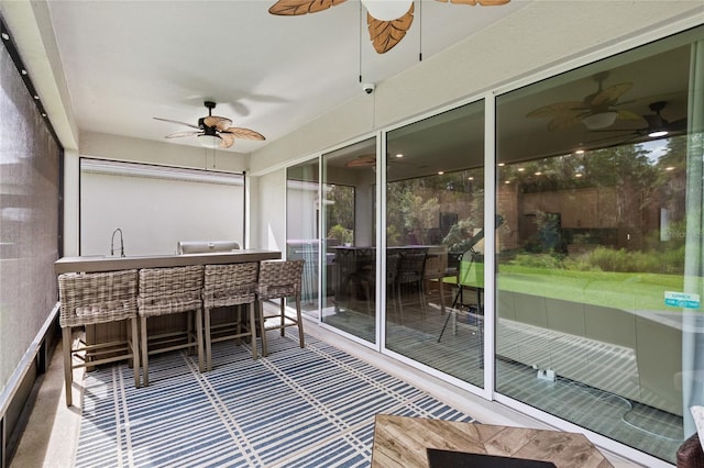 5065 Sparkling Water Way, Kissimmee, FL 34746 - sunroom / solarium with a ceiling fan