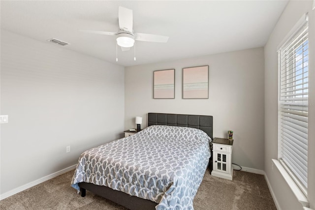 5065 Sparkling Water Way, Kissimmee, FL 34746 - bedroom with carpet floors and ceiling fan