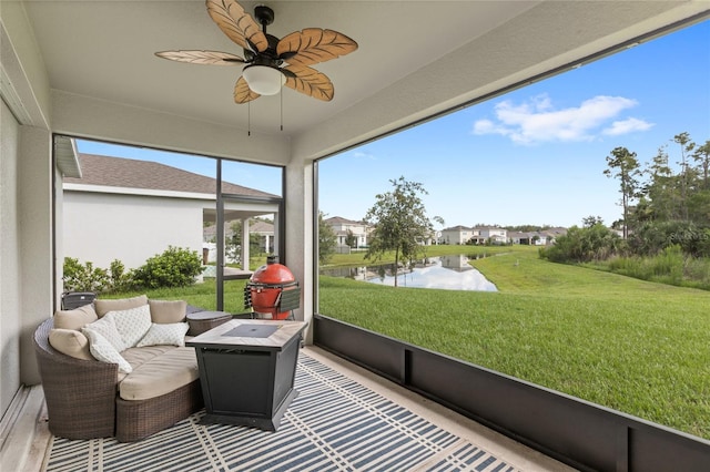 5065 Sparkling Water Way, Kissimmee, FL 34746 - sunroom with a ceiling fan, a water view, and a residential view
