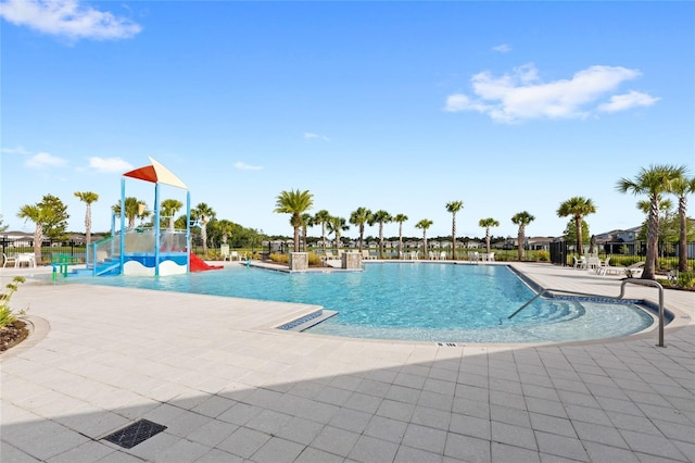 5065 Sparkling Water Way, Kissimmee, FL 34746 - community pool with a patio