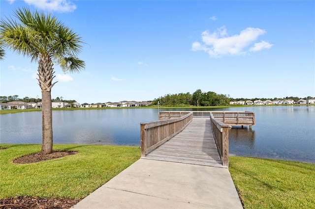 5065 Sparkling Water Way, Kissimmee, FL 34746 - dock area featuring a water view, a yard, and a residential view