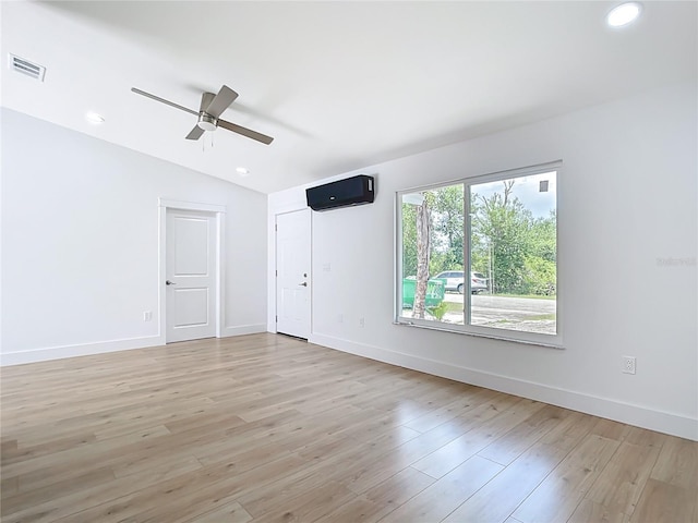 7341 Hart St, Englewood, FL 34224 - empty room with lofted ceiling, ceiling fan, light wood-type flooring, and recessed lighting
