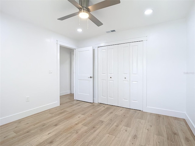 7341 Hart St, Englewood, FL 34224 - unfurnished bedroom with light wood-type flooring, recessed lighting, a closet, and a ceiling fan