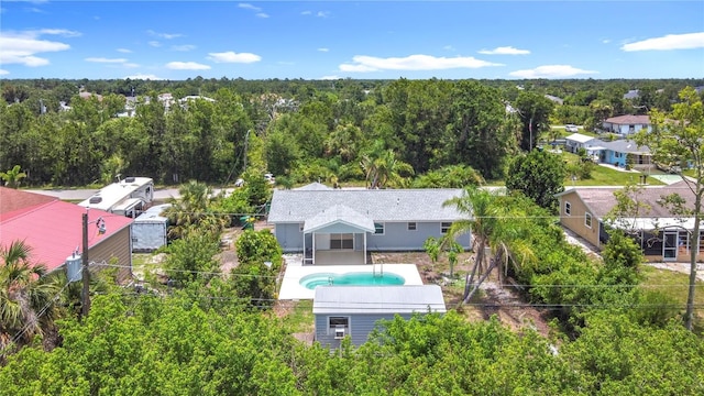 7341 Hart St, Englewood, FL 34224 - view of subject property with a pool and a forest