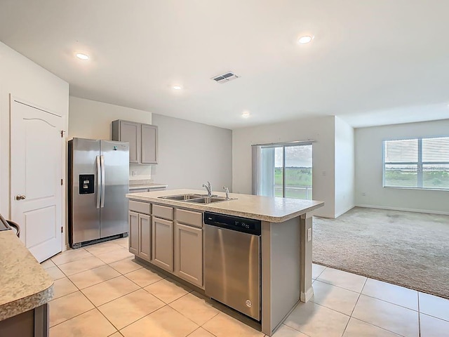 313 Sofia Ln, Lake Alfred, FL 33850 - kitchen featuring appliances with stainless steel finishes, light carpet, gray cabinetry, plenty of natural light, and recessed lighting