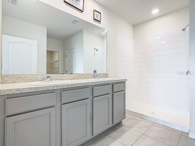 313 Sofia Ln, Lake Alfred, FL 33850 - full bath featuring tile patterned floors, double vanity, and tiled shower